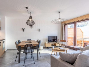 Bel appartement neuf de 55m², à 100m des pistes, 2 chambres, 2 SDB, WiFi, garage inclus - FR-1-351-212